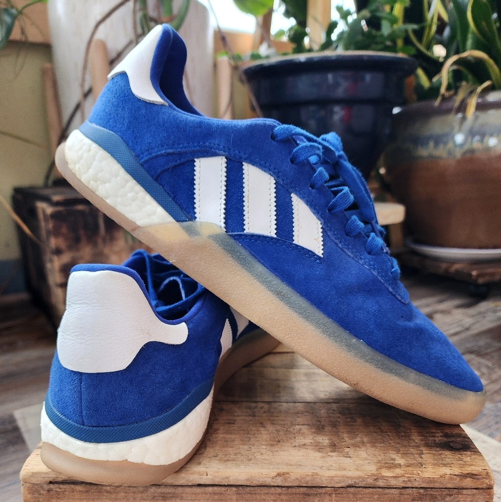 Size 10 blue Adidas sneakers.